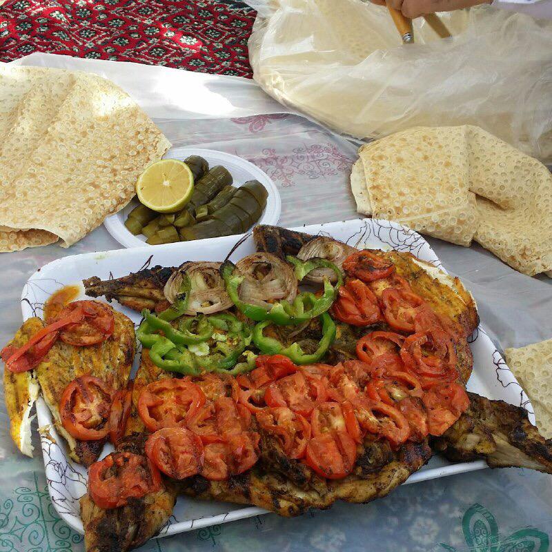 کباب ماهی ناوباخ در دور دریاچه زریوار مریوان کباب ماهی ناوباخ در دور دریاچه زریوار مریوان