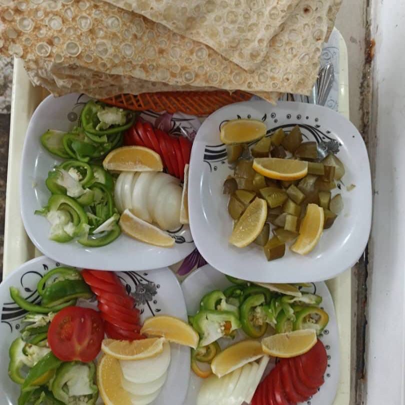 کباب ماهی ناوباخ در دور دریاچه زریوار مریوان کباب ماهی ناوباخ در دور دریاچه زریوار مریوان